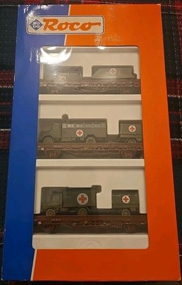 Roco 44024 H0 Set 3 Stk. Rungenwagen mit DRK Sanitätsfahrzeugen, DB, OVP