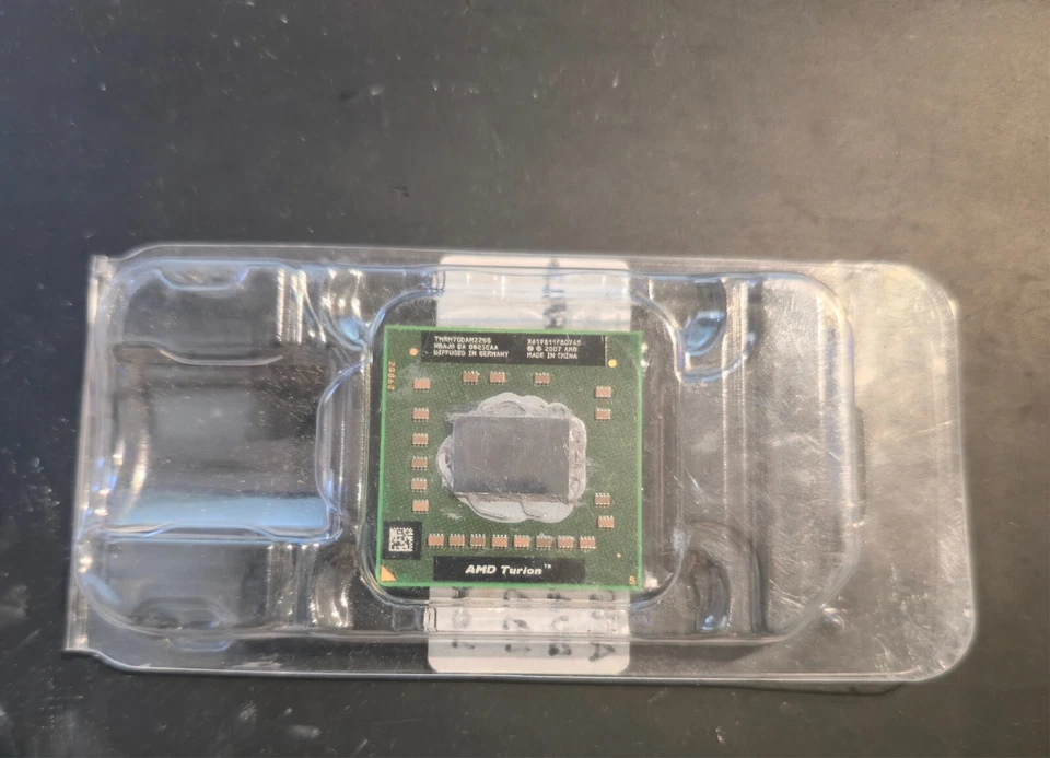 CPU AMD TURION 64 X2 RM-70 TMRM70DAM22GG 2.00GHZ SOCKET S1  - Immagine 3 di 3