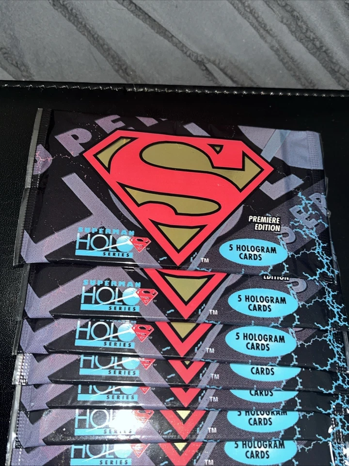 14 PAQUETES Superman Holo Series Edición Estreno (5 Paquetes de Cartas) SELLADO 1996 SkyBox Foto 2 de 2