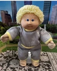1986 yellow hair blue eyes cabbage patch Kid Doll hm 5 yellow kitty suit