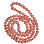 Vintage Austrian molded milk glass beads with red decor. 6mm. Strand of 100