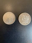 Lot of 2 Morgan silver dollars: 1888, 1900 O circulated, very good