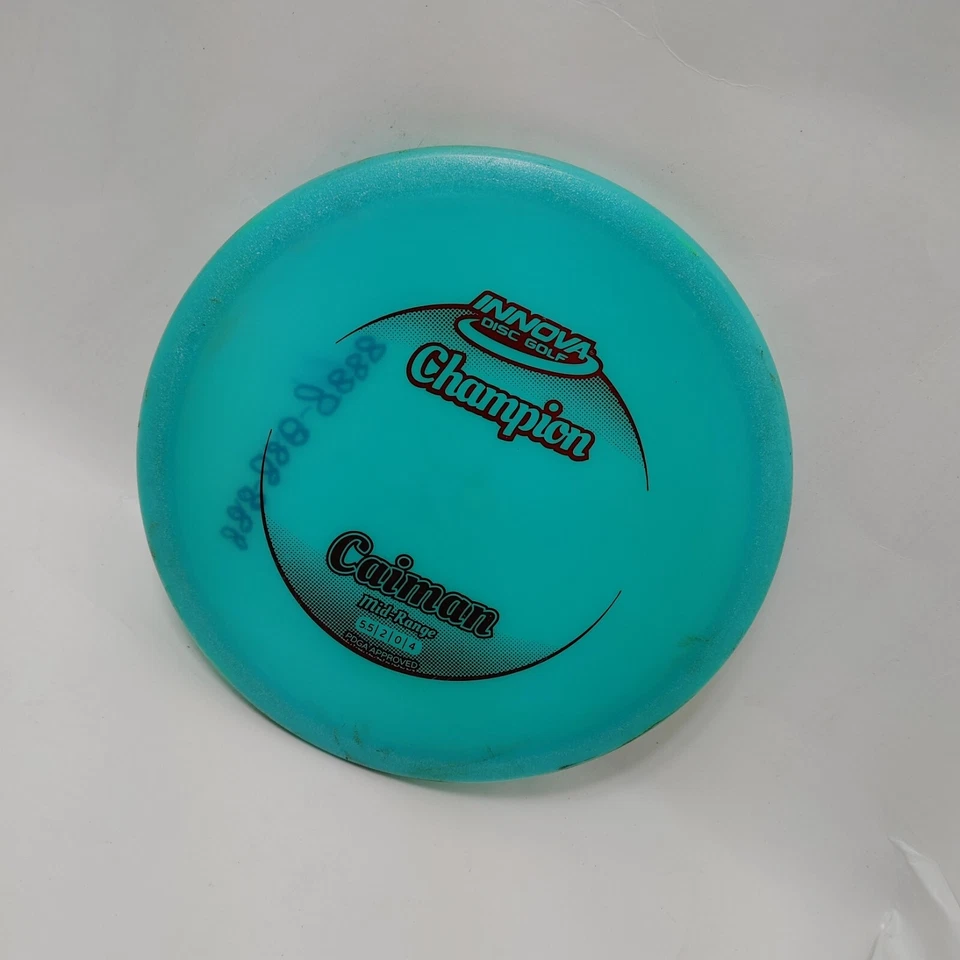 Disco de golf Innova Champion Caiman 175 g gris negro sello gama media entintado usado Foto 2 de 4