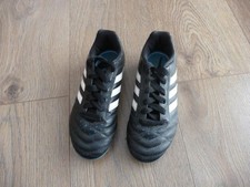Boy`s Adidas black football boots size 1