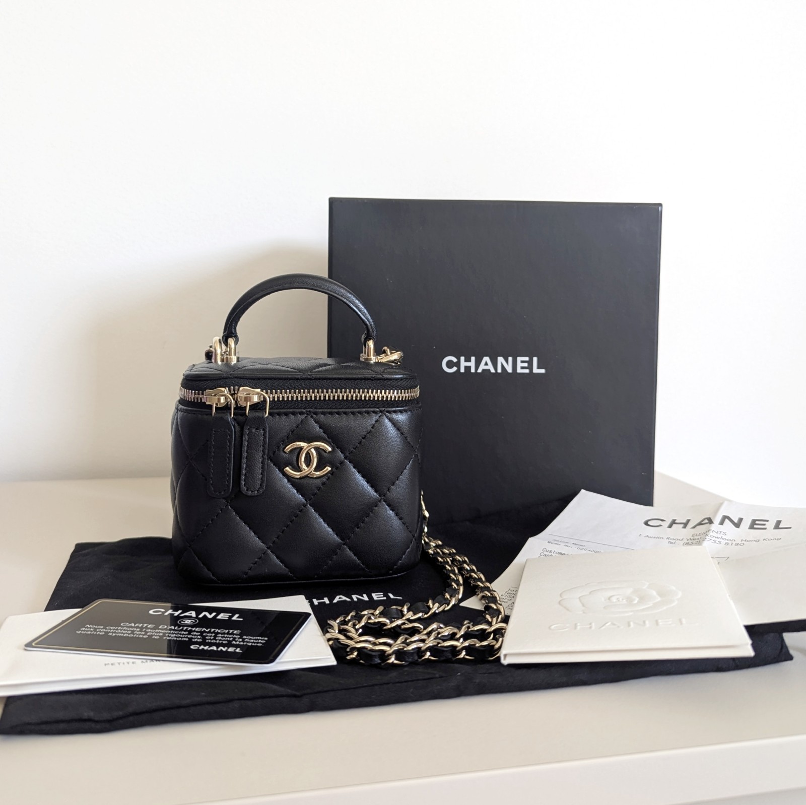 Chanel Mini Vanity Case with Top Handle & Chain In Black Lambskin Leather Gold