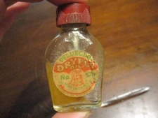 PFLUEGER DRY FLY OIL NO 879 FISHING REEL OILIER PAPER LABEL BOTTLE RARE BULLDOG