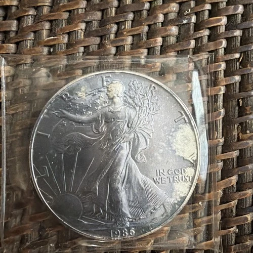 1986 American Eagle Silver Dollar - Uncirculated / Slight Toning