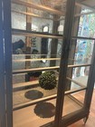 solid wood cabinet with thick glass shelves — photo 10