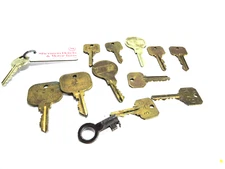 Indiana motel key on fob with 4 large loose keys and 7 small and unusual key 