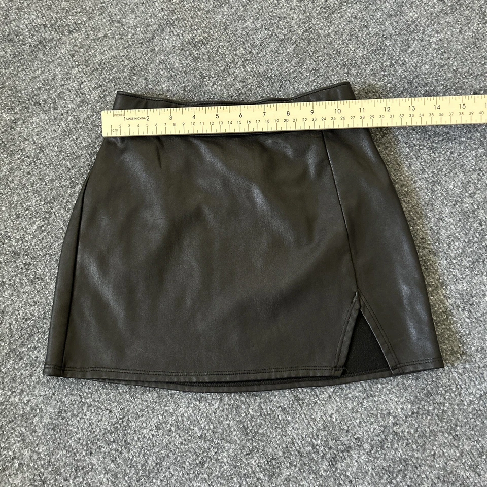 Minifalda negra abertura lateral Abercrombie Kids talla 7 Foto 3 de 4