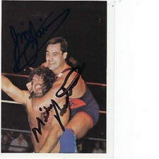 MIKE ROTUNDA & GORGEOUS JIMMY GARVIN SIGNED 1988 NWA WONDERAMA #236 - WWE LEGEND