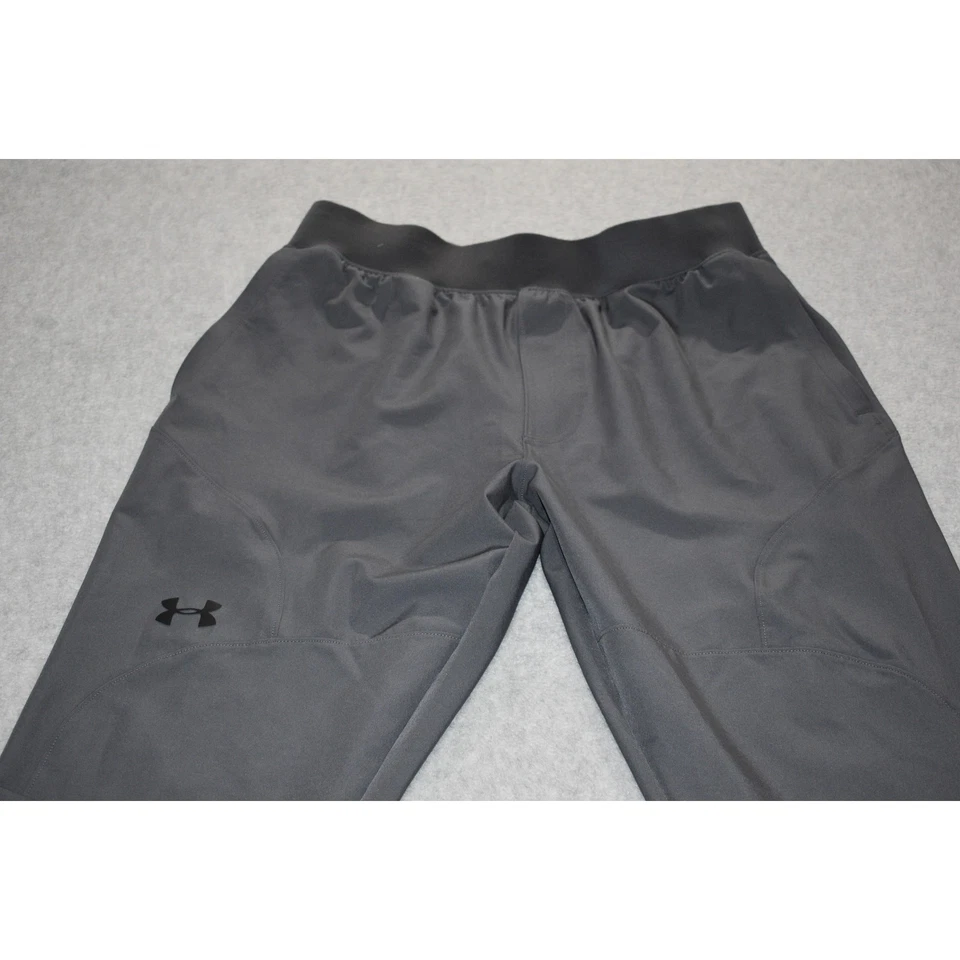 Pantalones de chándal Under Armour para gimnasio para hombre talla grande ajustados cónicos rendimiento gris Foto 3 de 4