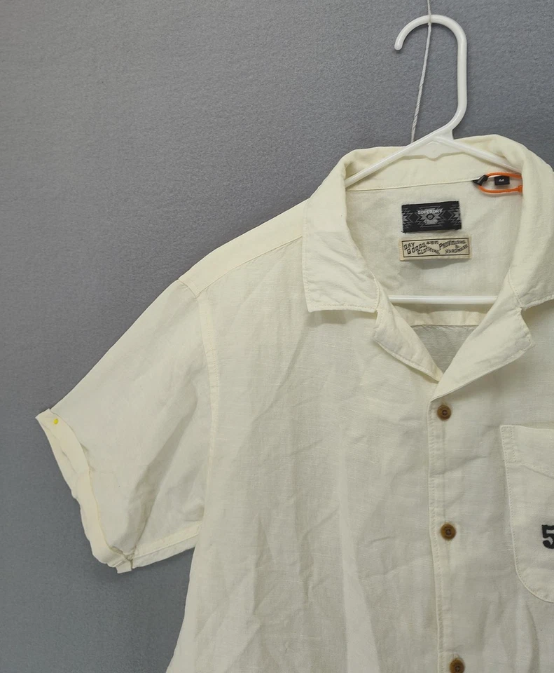 Superdry Camisa Hombre Mediana Crema Manga Corta ButtonUp Mad 5¢ Bolsillo Logo Informal Foto 2 de 4
