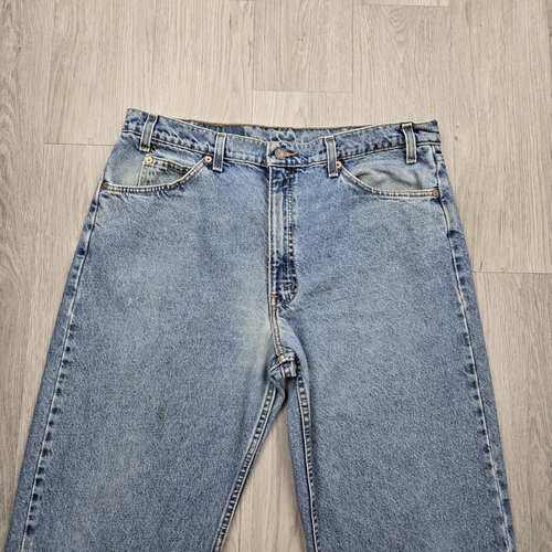 Jeans vintage Levis arancione tab 38x30 blu stone wash 550 invecchiato USA anni 90 - Foto 13 di 13