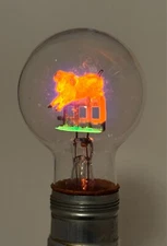 VINTAGE WORKING AEROLUX NEON LIGHT BULB WITH RAM JUMPING A FENCE NOS