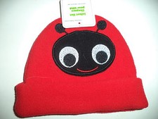 One Size Red Infant Polyester Hat With A Black Bug Face With Smile