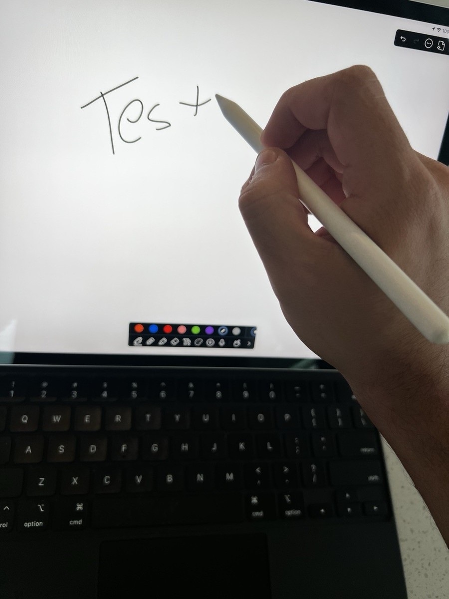 Silver 4th gen iPad Pro with Magic Keyboard (black) and Apple