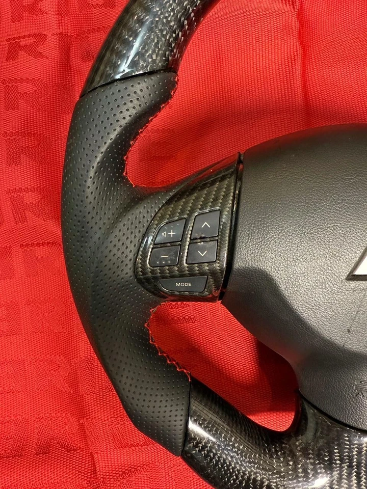 MITSUBISHI LANCER EVOLUTION 2007-2016 VOLANTE SUPERPUESTO FIBRA CARBONO REAL Foto 2 de 4