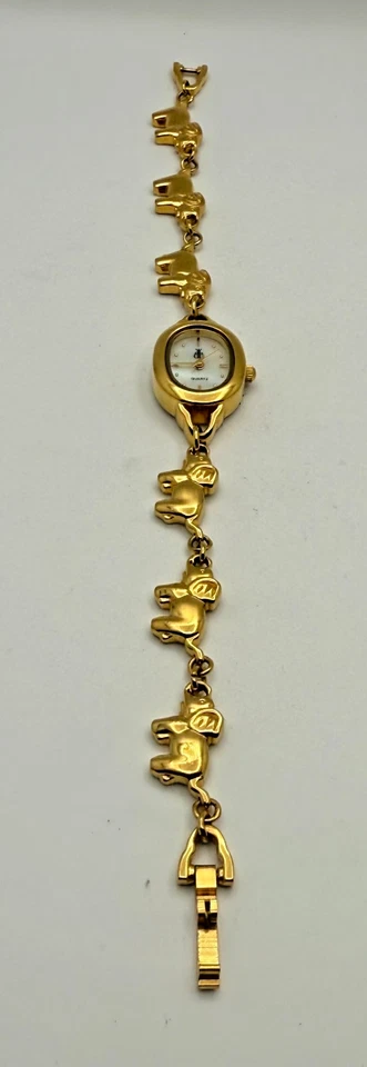 Reloj Brooks & Bentley vintage para mujer de los años 80 tono dorado con dije de elefante en caja Foto 3 de 4