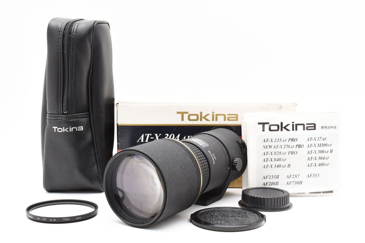 Tokina AT-X AF 300mm f/4 Lens for Canon w/ Box Case [Near Tokina AT-X AF 300mm f/4 Lens for Canon w/ Box Case [Near