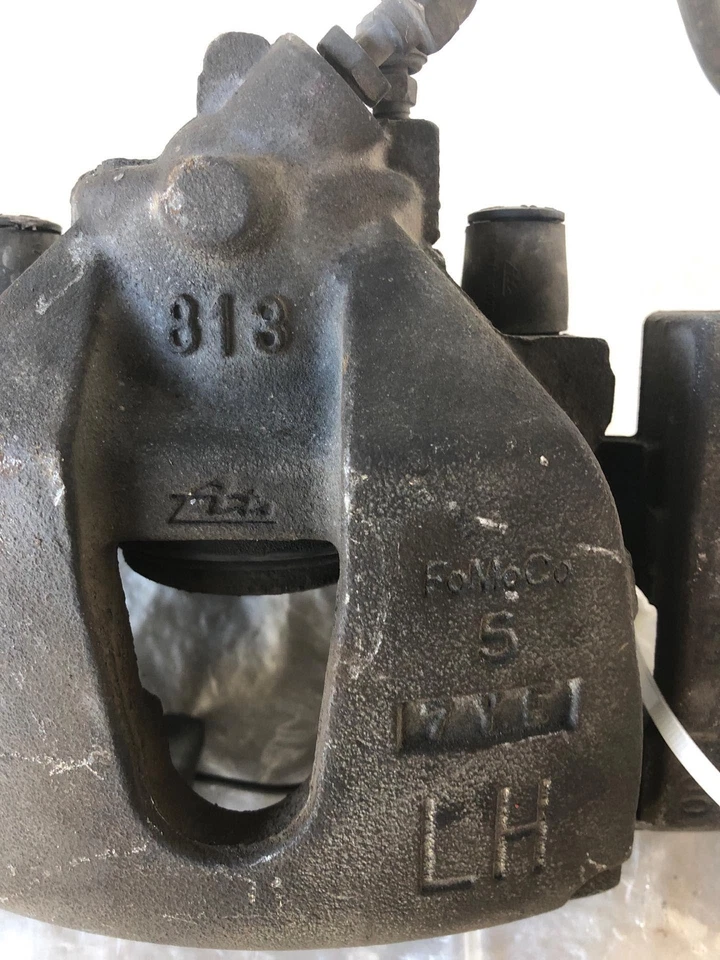 Conjunto de pinza de freno delantera Mazda 3 Sport 2004-2013 lado izquierdo del conductor LH OEM Foto 4 de 4