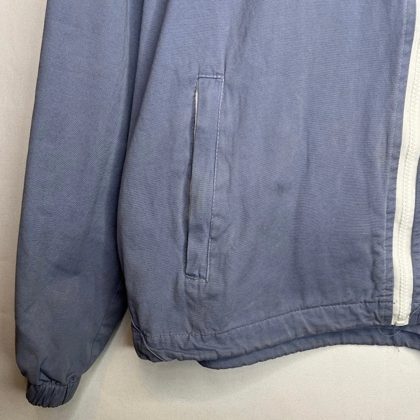 Chaqueta cortavientos John Galt California azul con capucha para mujer OS blanca cremallera Foto 4 de 4