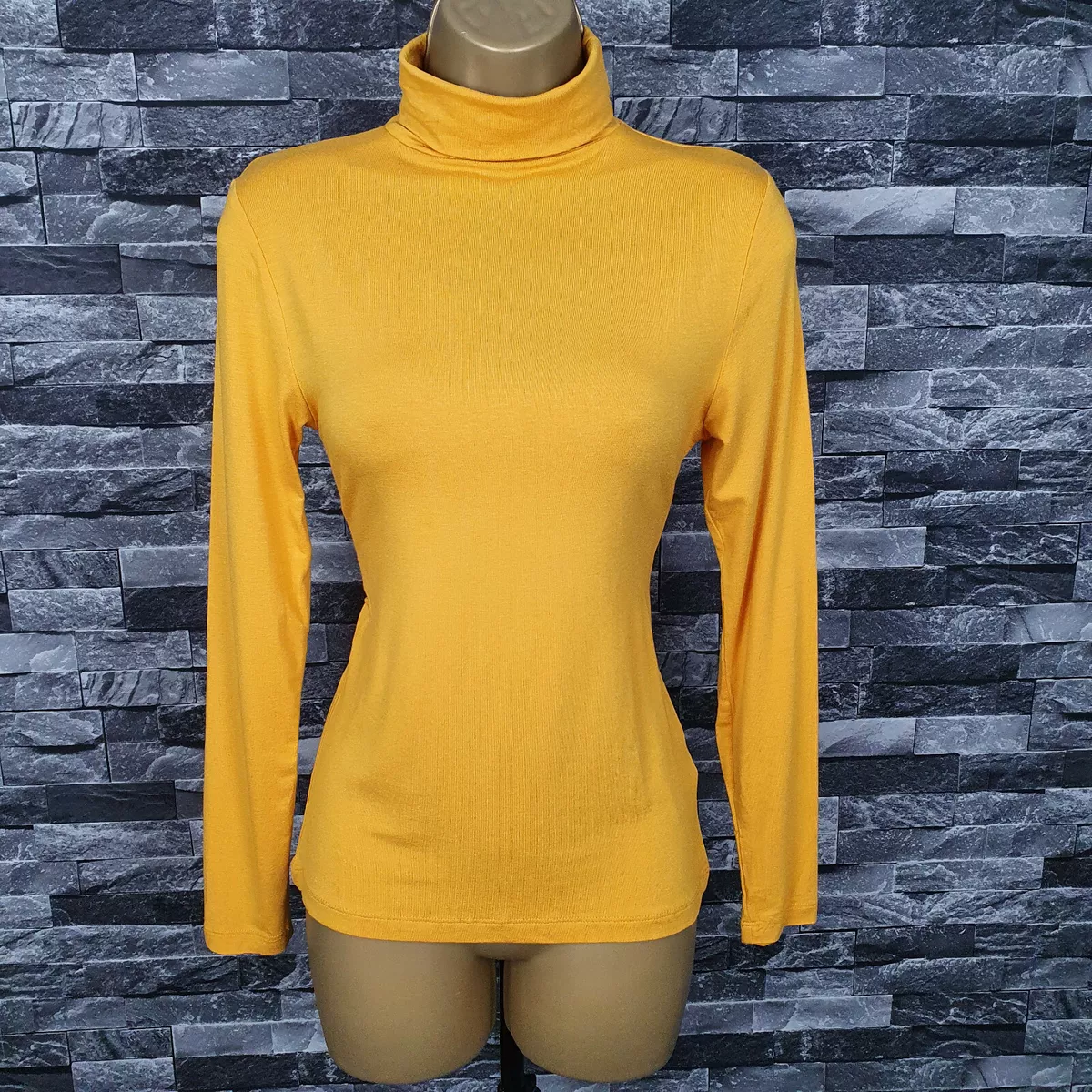 Peacocks top roll neck