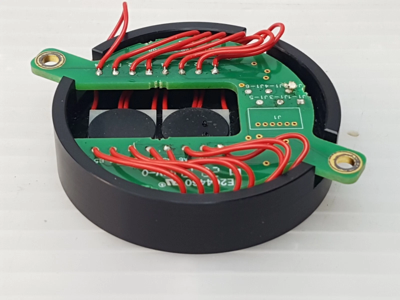Side view of the Ophir 7E09488 assembly showing the black anodized housing