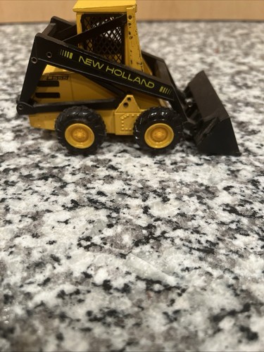 Sperry New Holland L-555 Super Boom Loader / Skid Steer 1/25 Scale NZG No. 276