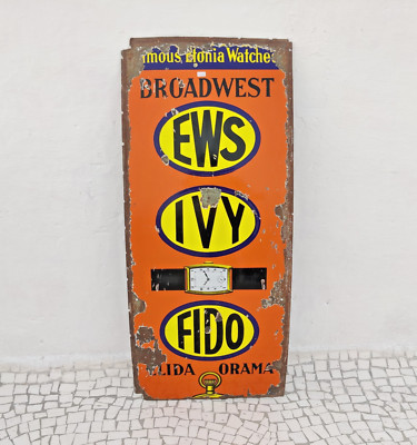 Vintage EWS Fido Elida Orama Armband- Und Taschenuhr Werbeemaille Schild EB708