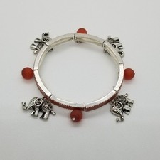 silver tone orange stretch bracelet with elephants