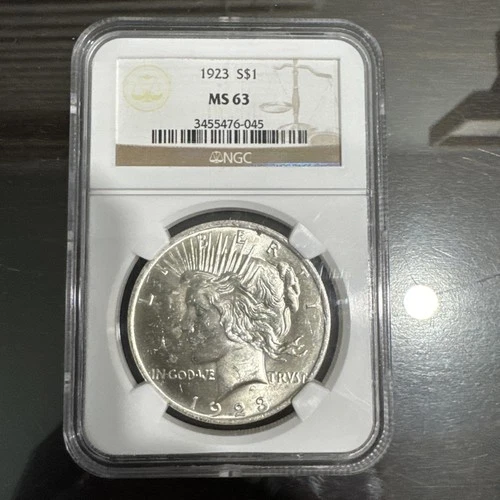 1923 PEACE SILVER DOLLAR . NGC CERTIFIED MS63.