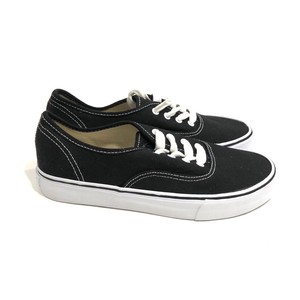black canvas shoes with white laces