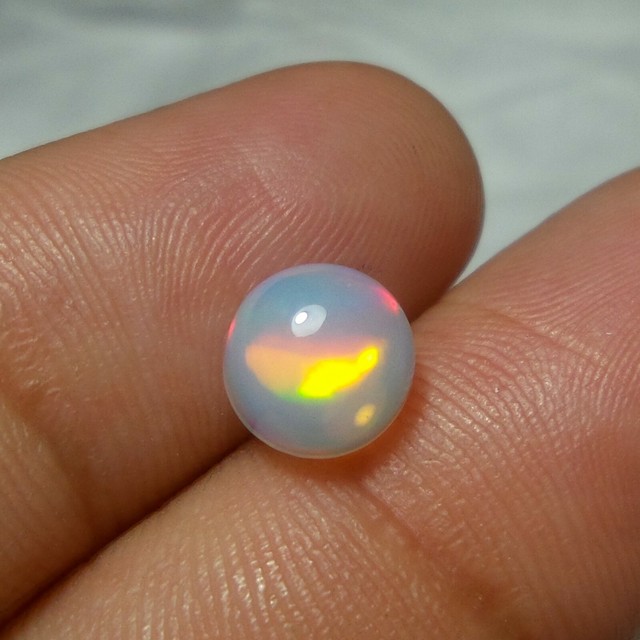 7.2 MM White Base Natural Ethiopian Fire Opal Round