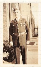 Vintage Photo WWII Soldier in Uniform with Medals Outside Home