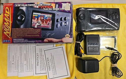 Sega Genesis Nomad Console. In Box. CIB. Missing cardboard insert. Box rough.
