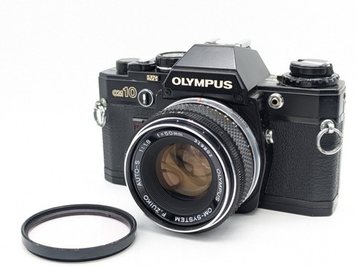 Olympus OM-10 kit fotocamera pellicola 35mm corpo nero con obiettivo perfettamente funzionante ottimo co