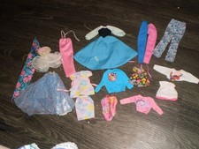 lot of vintage Barbie clothes