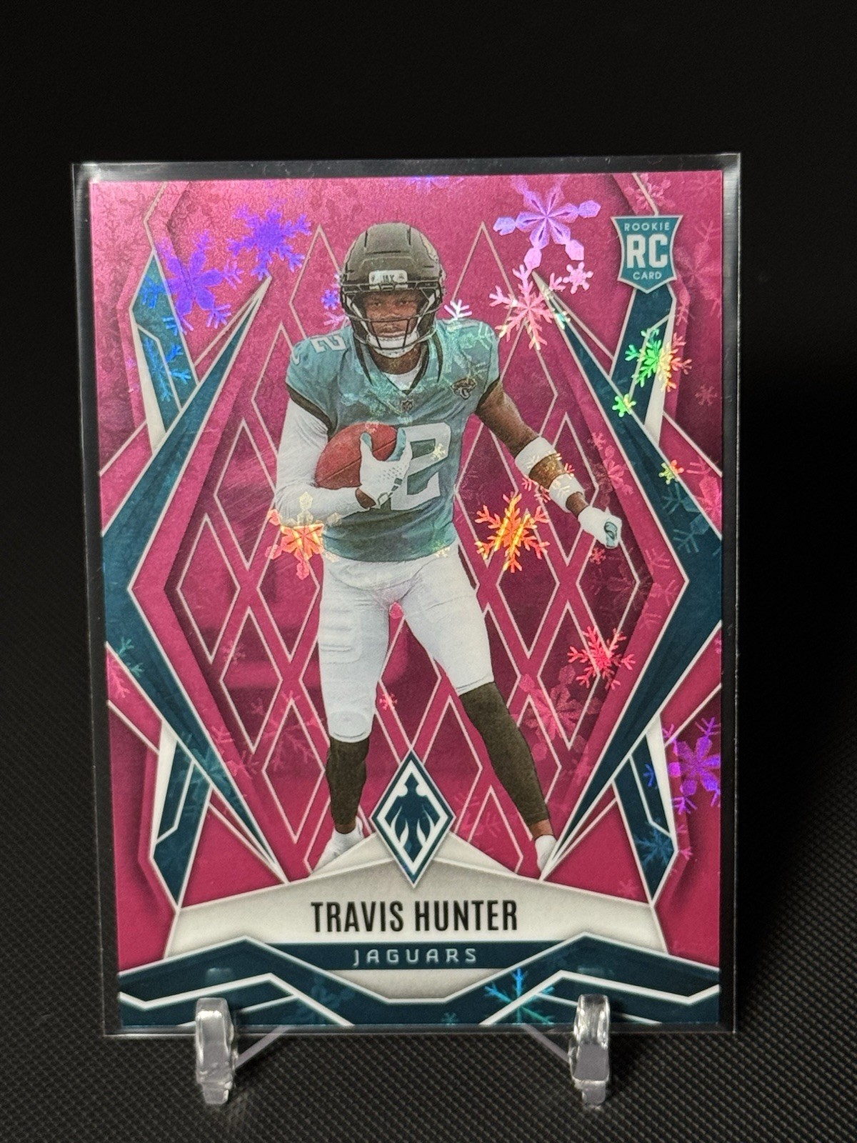2025 Panini Phoenix - Winter Travis Hunter #157 Pink Winter /299 (RC)