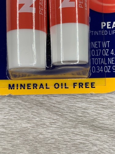 Nivea 2 pack Nourishing Moisture peach tinted lip balm .34 ounces - Picture 4 of 7