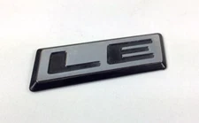 91-95 CHRYSLER DODGE LE EMBLEM CARAVAN PLYMOUTH VOYAGER NAMEPLATE 4576149 19030