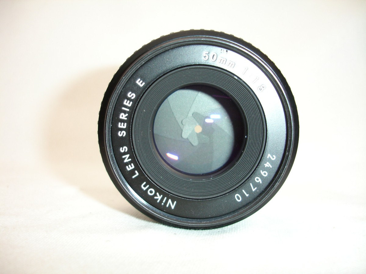 NIKON FE 35mm SLR Film Camera Body with 50mm f/ 1.8 lens , works
