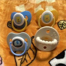 Lot of 4 Animal Theme Pacifiers Blue Yellow White Silicone Round Nipple