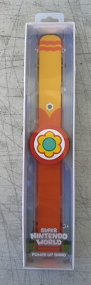 NEW Super Nintendo World Power Up Band Princess Daisy Mario Universal Hollywood