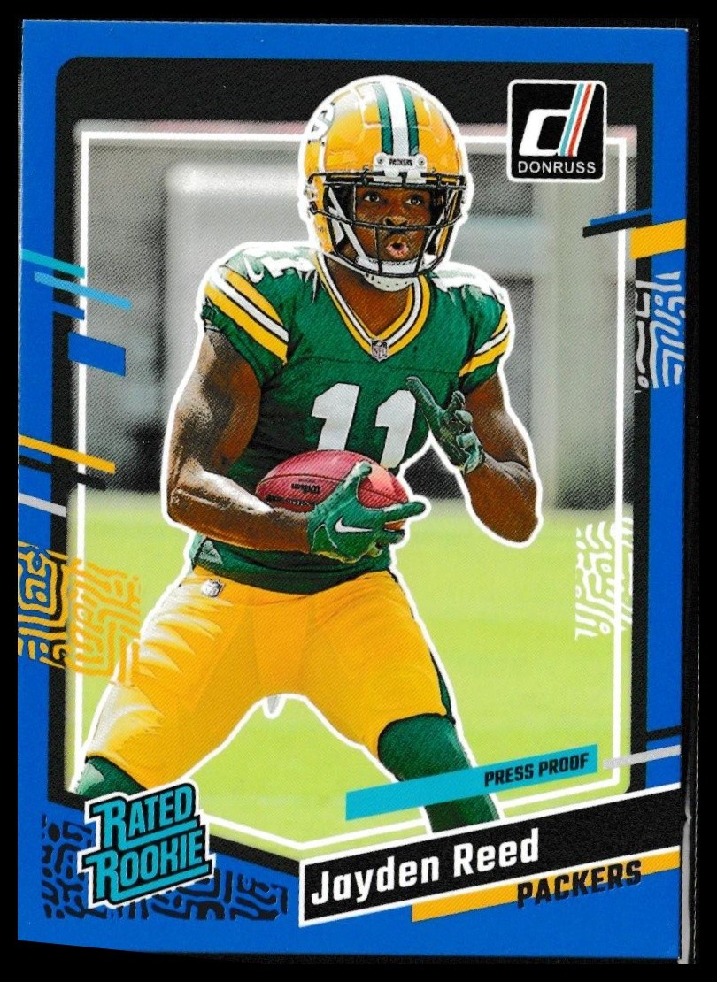 2023 Donruss #334 Jayden Reed Press Proof Blue