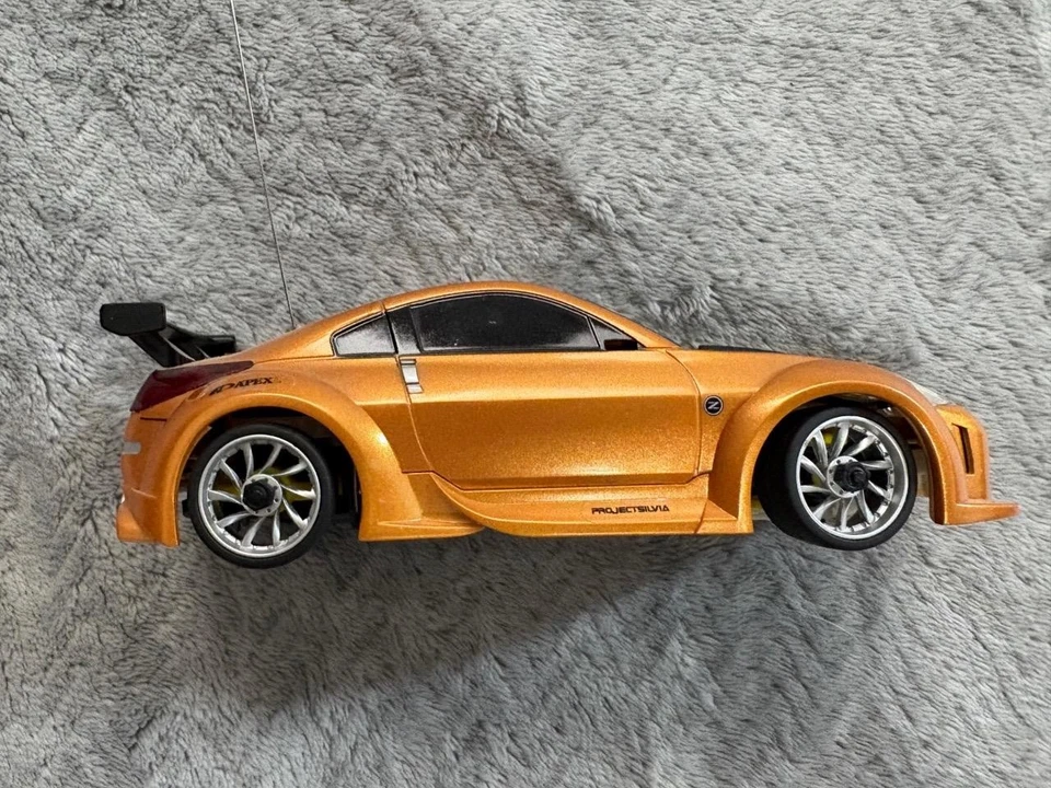 Xmods 2004 Nissan 350z Copper Orange 1:28 w/ Light & Body Kit Extras - Image 4 of 4