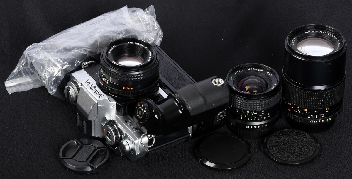 Minolta X-70 Chrome 35mm Film SLR c/w MD-1, 50/1.7, 28/2.8