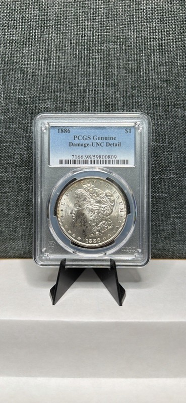 1886 Morgan Silver Dollar PCGS Genuine Damaged Uncirculated Detail Coin