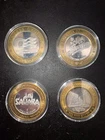 4 Casino Silver strikes .999 silver each coin is .6 of a troy 1 oz = 2.4  oz