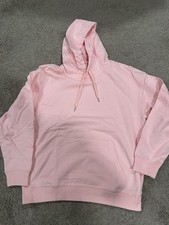 Hoddie rosa claro en blanco 100 % algodón se puede utilizar para una marca de ropa.